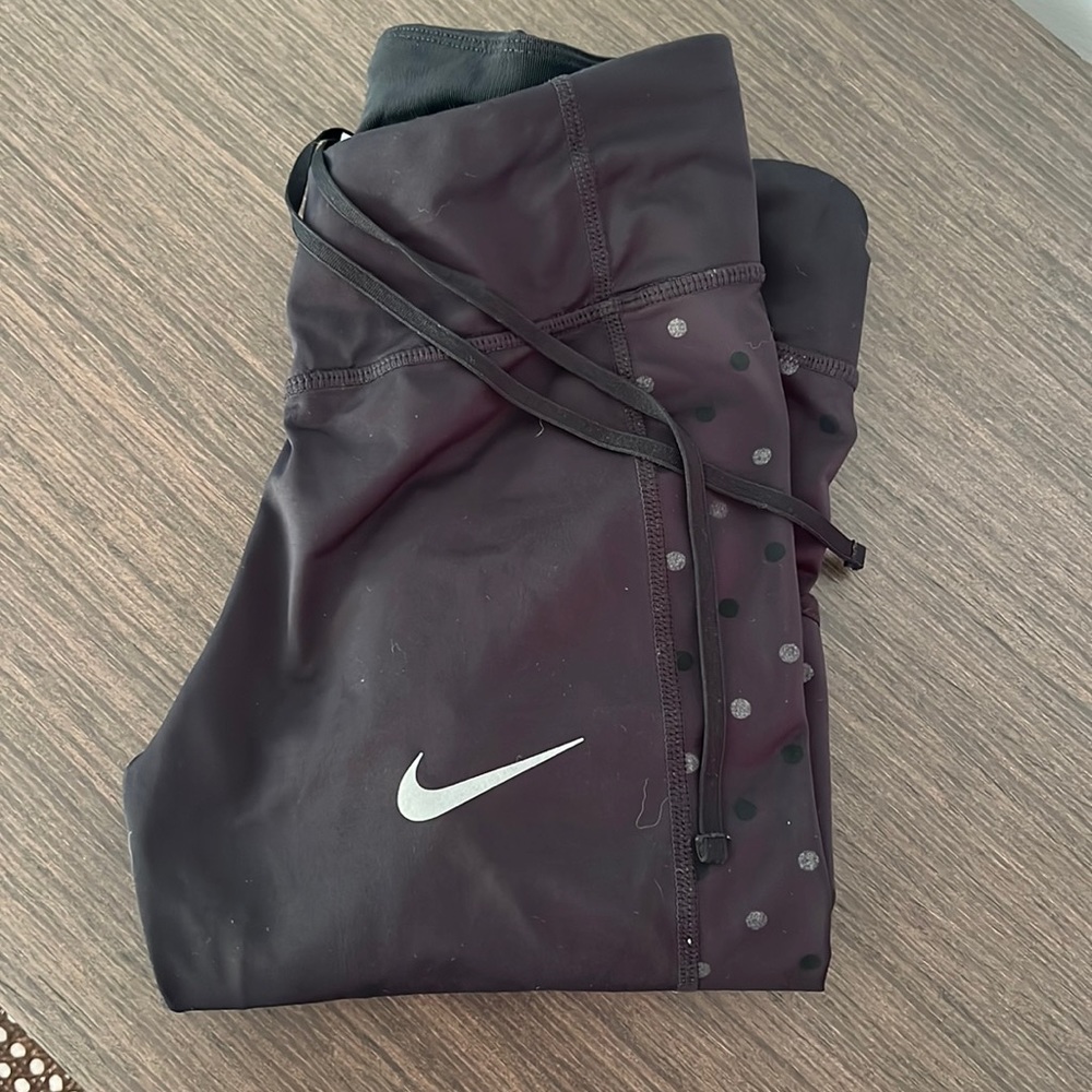Nike running pants with reflective dots